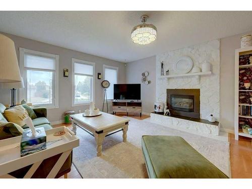 49 Chappel Drive, Red Deer, AB - Indoor Photo Showing Living Room With Fireplace