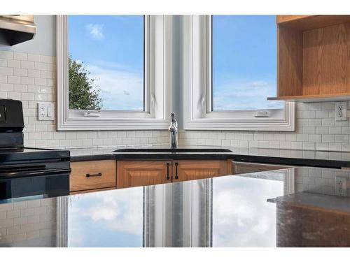 58 Sunset Harbour, Rural Wetaskiwin No. 10, County Of, AB - Indoor Photo Showing Kitchen With Double Sink