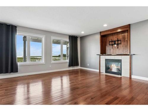 58 Sunset Harbour, Rural Wetaskiwin No. 10, County Of, AB - Indoor Photo Showing Living Room With Fireplace