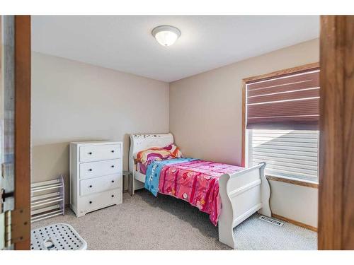 75 Kerr Close, Red Deer, AB - Indoor Photo Showing Bedroom