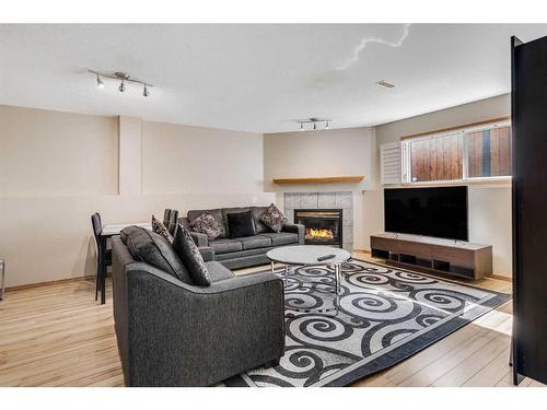 75 Kerr Close, Red Deer, AB - Indoor Photo Showing Living Room With Fireplace