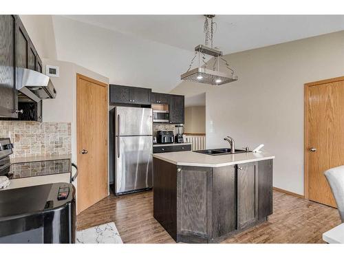 75 Kerr Close, Red Deer, AB - Indoor Photo Showing Kitchen With Stainless Steel Kitchen With Double Sink