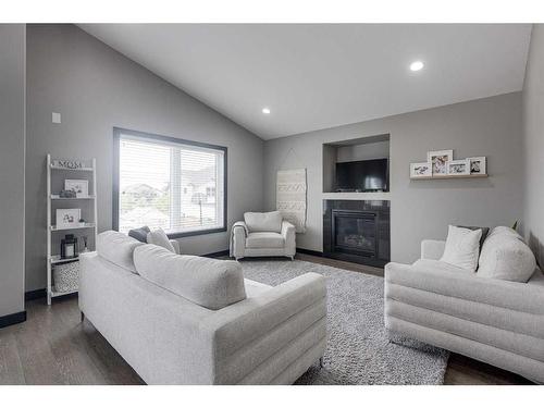 400 Timothy Drive, Red Deer, AB - Indoor Photo Showing Living Room With Fireplace