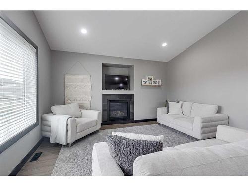 400 Timothy Drive, Red Deer, AB - Indoor Photo Showing Living Room With Fireplace