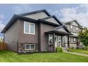 400 Timothy Drive, Red Deer, AB  - Outdoor With Facade 