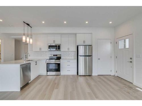 86-2117 81 Street Sw, Calgary, AB - Indoor Photo Showing Kitchen With Stainless Steel Kitchen With Upgraded Kitchen