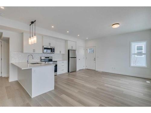 86-2117 81 Street Sw, Calgary, AB - Indoor Photo Showing Kitchen With Upgraded Kitchen