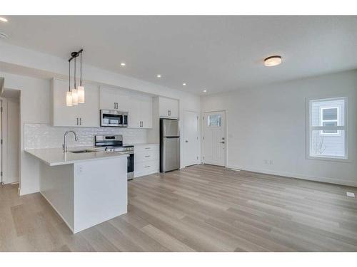 86-2117 81 Street Sw, Calgary, AB - Indoor Photo Showing Kitchen With Upgraded Kitchen