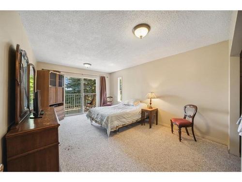 37550 C & E Trail, Rural Red Deer County, AB - Indoor Photo Showing Bedroom