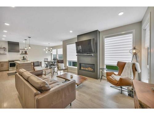 20 Ellington Crescent, Red Deer, AB - Indoor Photo Showing Living Room With Fireplace