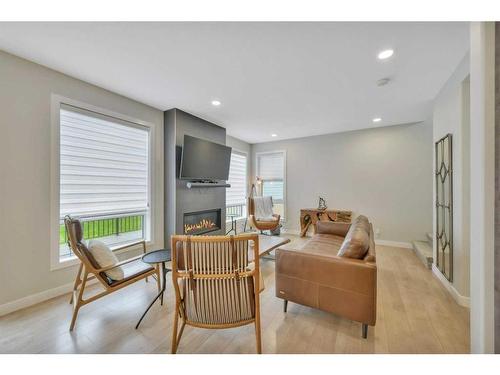 20 Ellington Crescent, Red Deer, AB - Indoor Photo Showing Living Room With Fireplace