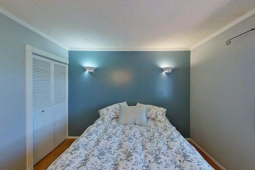 214 8 Avenue Ne, Sundre, AB - Indoor Photo Showing Bedroom