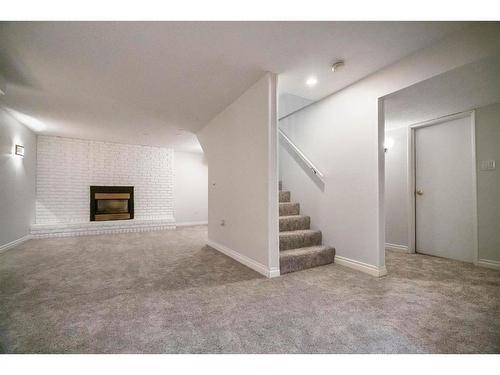 4405 66 Street, Camrose, AB - Indoor With Fireplace