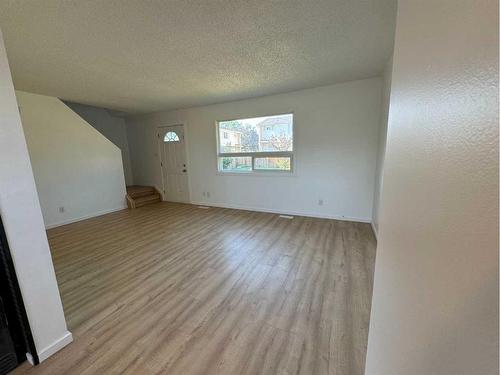 #F4-35 Nash Street, Red Deer, AB - Indoor Photo Showing Other Room