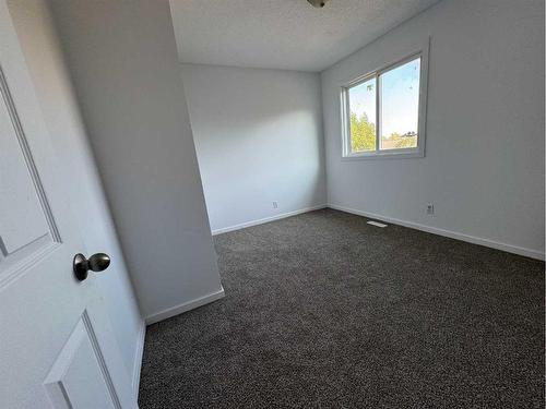 #F4-35 Nash Street, Red Deer, AB - Indoor Photo Showing Other Room