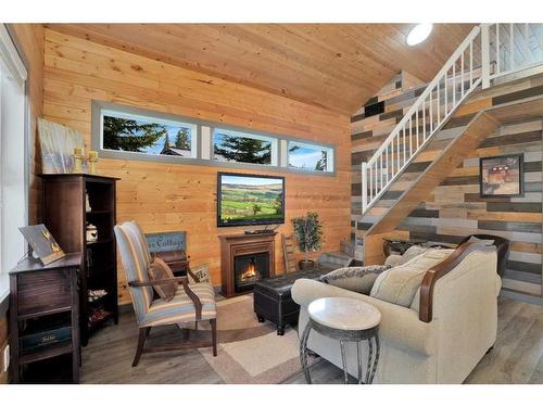 103-73014 Highway 591, Rural Clearwater County, AB - Indoor Photo Showing Other Room With Fireplace