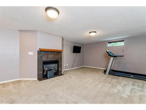 115-28342 Township Road, Rural Red Deer County, AB - Indoor With Fireplace