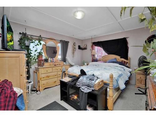 4707 50 Avenue, Caroline, AB - Indoor Photo Showing Bedroom