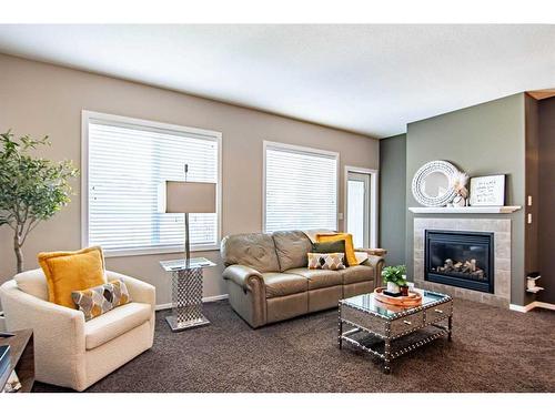 20 Tallman Close, Red Deer, AB - Indoor Photo Showing Living Room With Fireplace