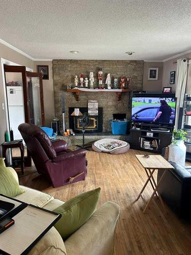 63 Selkirk Boulevard, Red Deer, AB - Indoor Photo Showing Living Room With Fireplace