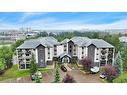 404-5601 Kerry Wood Drive, Red Deer, AB  - Outdoor With Facade 