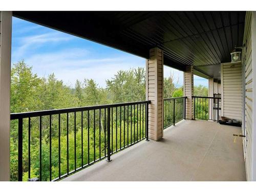 404-5601 Kerry Wood Drive, Red Deer, AB - Outdoor With Deck Patio Veranda With Exterior