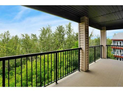 404-5601 Kerry Wood Drive, Red Deer, AB - Outdoor With Deck Patio Veranda With Exterior