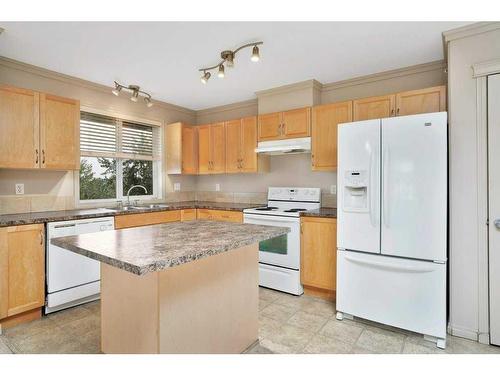 404-5601 Kerry Wood Drive, Red Deer, AB - Indoor Photo Showing Kitchen With Double Sink