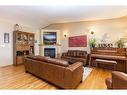 144 Ammeter Close, Red Deer, AB  - Indoor Photo Showing Living Room With Fireplace 