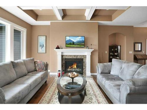 42 Coachill Street, Blackfalds, AB - Indoor Photo Showing Living Room With Fireplace