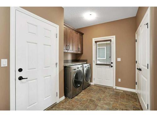 42 Coachill Street, Blackfalds, AB - Indoor Photo Showing Laundry Room