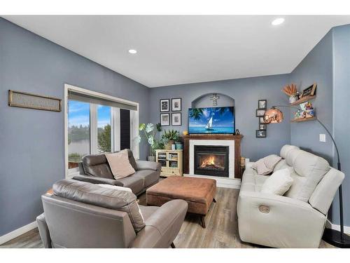 5821 Panorama Drive, Blackfalds, AB - Indoor Photo Showing Living Room With Fireplace