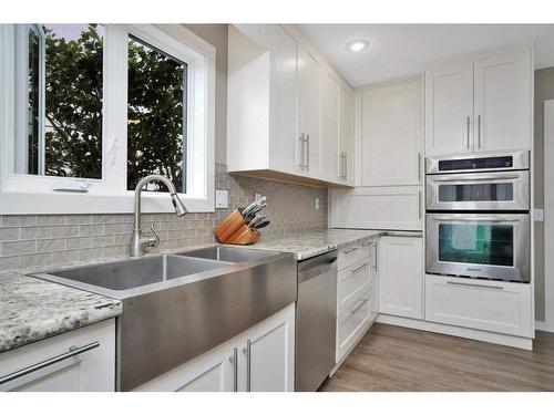 71 Anquetel Street, Red Deer, AB - Indoor Photo Showing Kitchen With Double Sink With Upgraded Kitchen