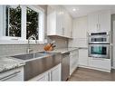 71 Anquetel Street, Red Deer, AB  - Indoor Photo Showing Kitchen With Double Sink With Upgraded Kitchen 