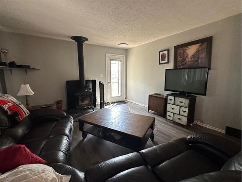 36254 Range Road 275, Rural Red Deer County, AB - Indoor Photo Showing Living Room With Fireplace