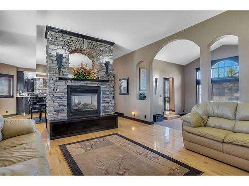 4 Fieldstone Way, Sylvan Lake, AB - Indoor Photo Showing Living Room With Fireplace