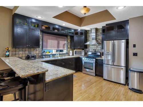 4 Fieldstone Way, Sylvan Lake, AB - Indoor Photo Showing Kitchen With Double Sink