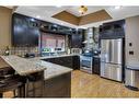 4 Fieldstone Way, Sylvan Lake, AB  - Indoor Photo Showing Kitchen With Double Sink 