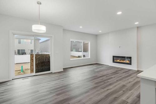 69 Emmett Crescent, Red Deer, AB - Indoor Photo Showing Living Room With Fireplace