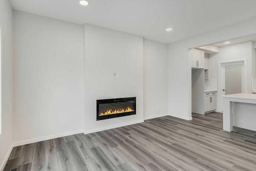 69 Emmett Crescent, Red Deer, AB - Indoor Photo Showing Living Room With Fireplace