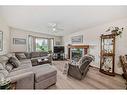 6418 55 Avenue, Ponoka, AB  - Indoor Photo Showing Living Room With Fireplace 