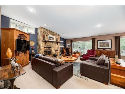 5432 58A Street Crescent, Lacombe, AB - Indoor Photo Showing Living Room With Fireplace