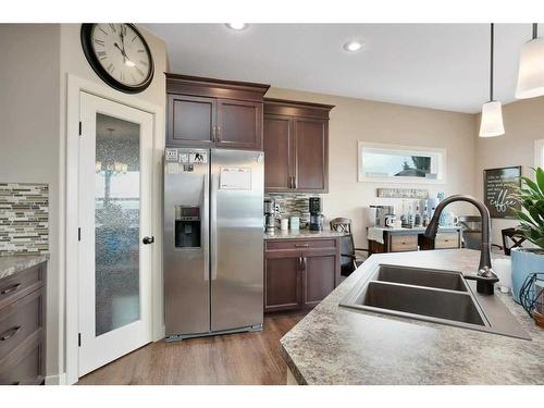 11 Henderson Close, Penhold, AB - Indoor Photo Showing Kitchen With Double Sink