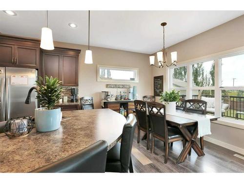 11 Henderson Close, Penhold, AB - Indoor Photo Showing Dining Room