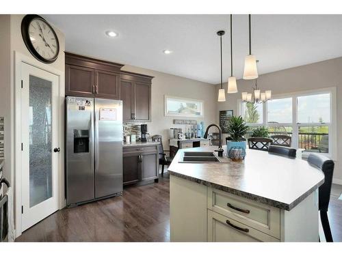 11 Henderson Close, Penhold, AB - Indoor Photo Showing Kitchen With Double Sink