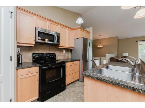 41 Inglewood Drive, Red Deer, AB - Indoor Photo Showing Kitchen With Double Sink