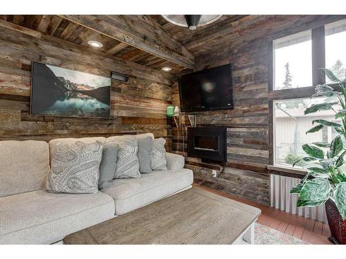 3526 Spruce Drive, Red Deer, AB - Indoor Photo Showing Living Room With Fireplace