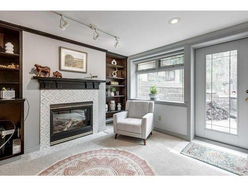 3526 Spruce Drive, Red Deer, AB - Indoor Photo Showing Living Room With Fireplace