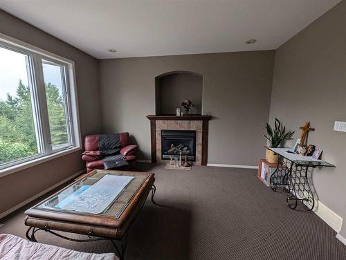 53 Pondside Crescent, Blackfalds, AB - Indoor With Fireplace