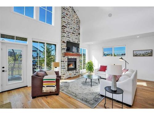 12 Songbird Green, Sylvan Lake, AB - Indoor Photo Showing Living Room With Fireplace